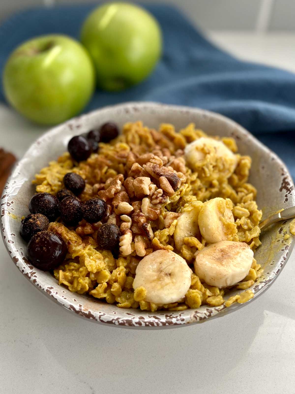 turmeric oatmeal topped with bananas