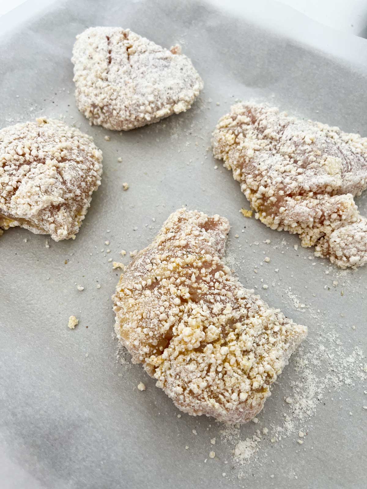 breaded chicken on pan