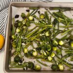 roasted brussles sprouts and sparagus on a sheet pan