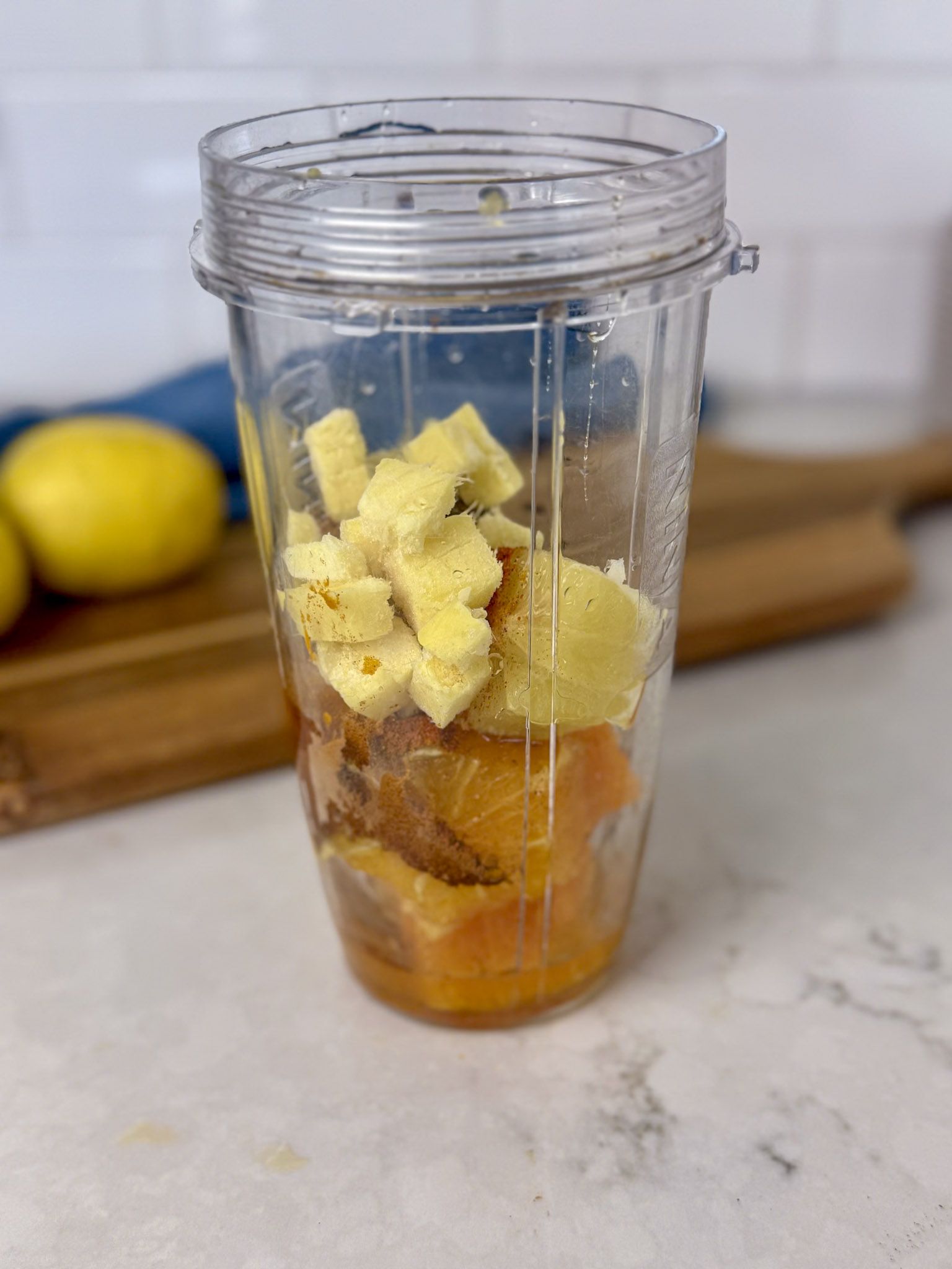 immunity shot ingredients in a blender
